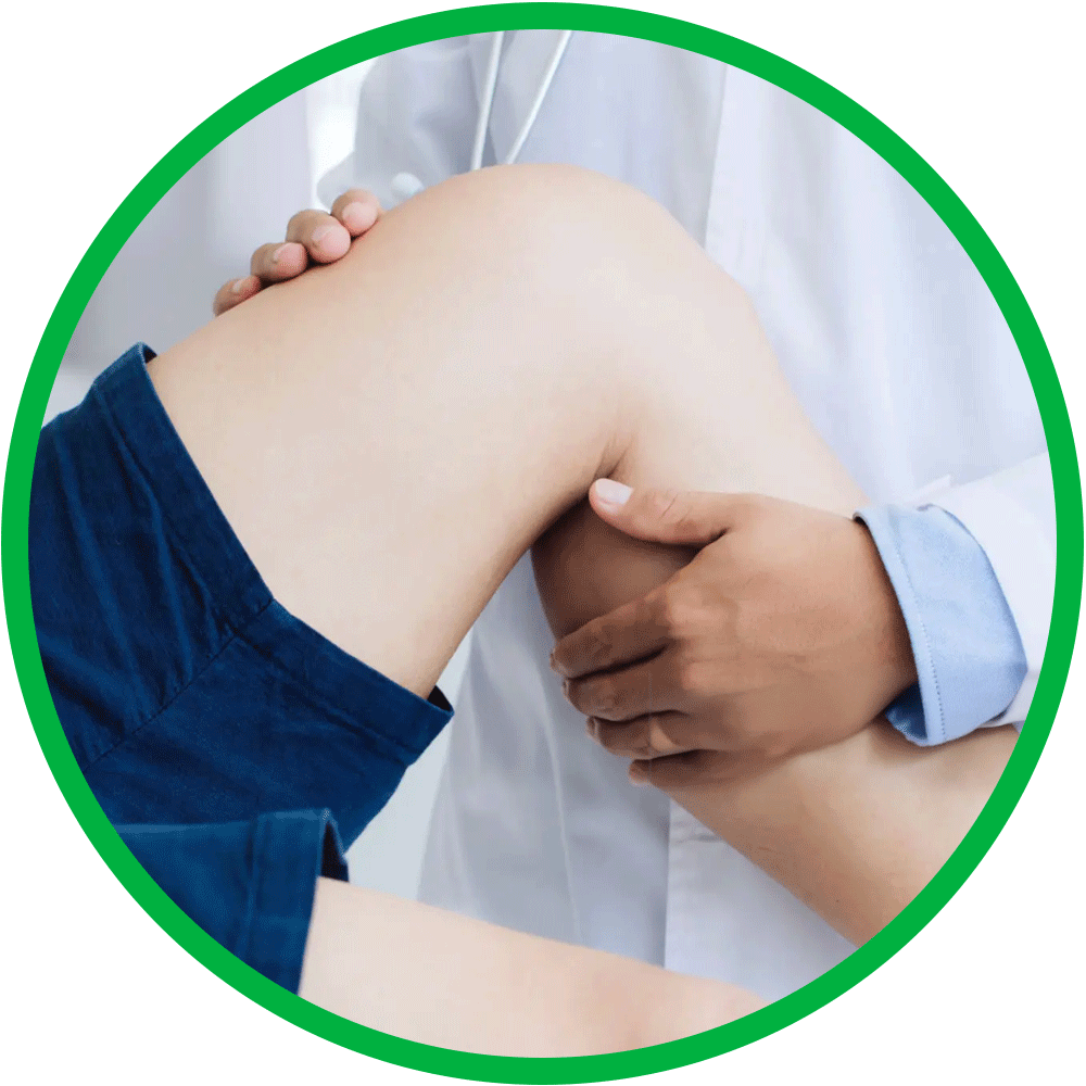 Male caregiver examines male knee for flexibility